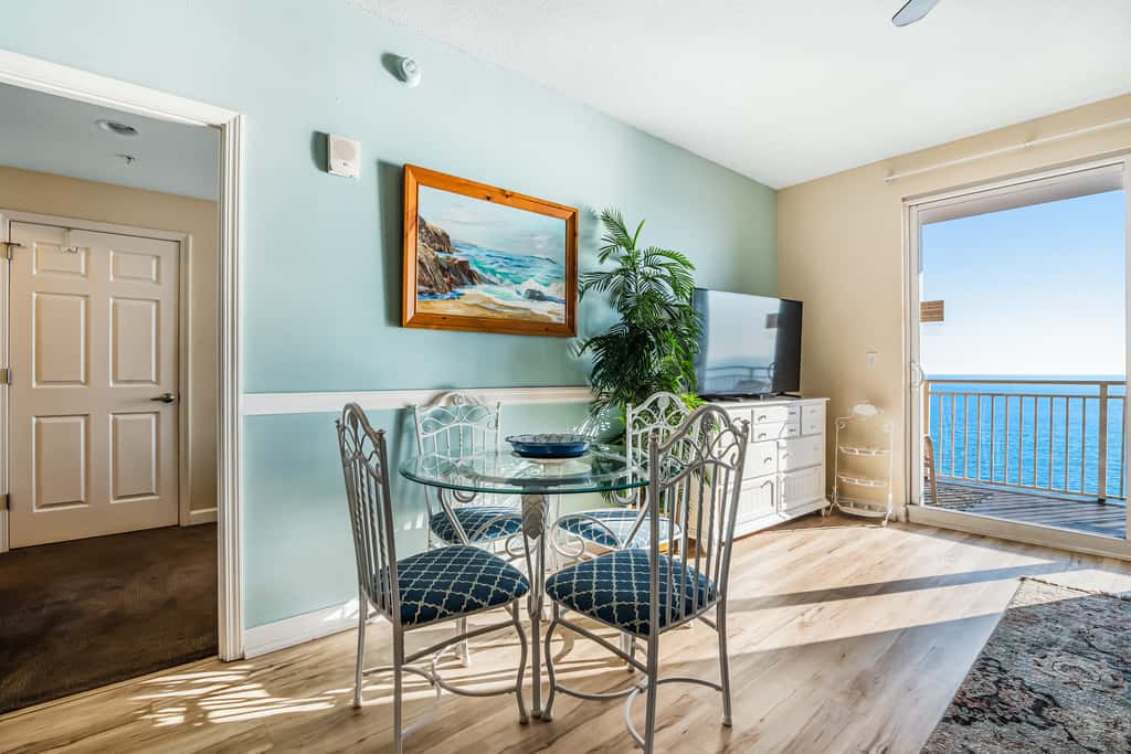 Snow-bird friendly condo with pool & fitness room - walk right out to the sand