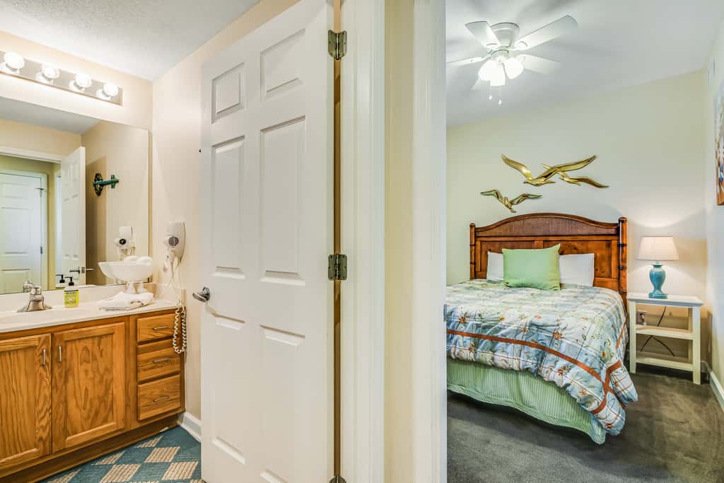 Snow-bird friendly condo with pool & fitness room - walk right out to the sand