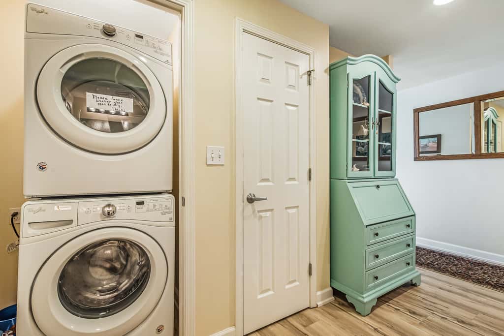 Snow-bird friendly condo with pool & fitness room - walk right out to the sand