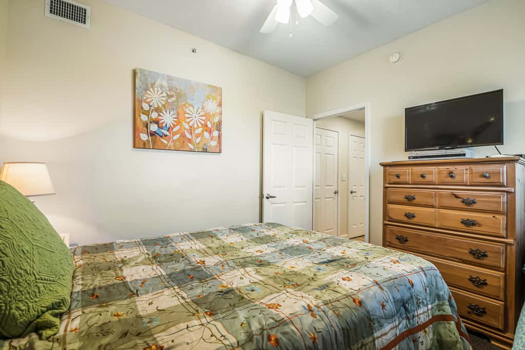 Snow-bird friendly condo with pool & fitness room - walk right out to the sand