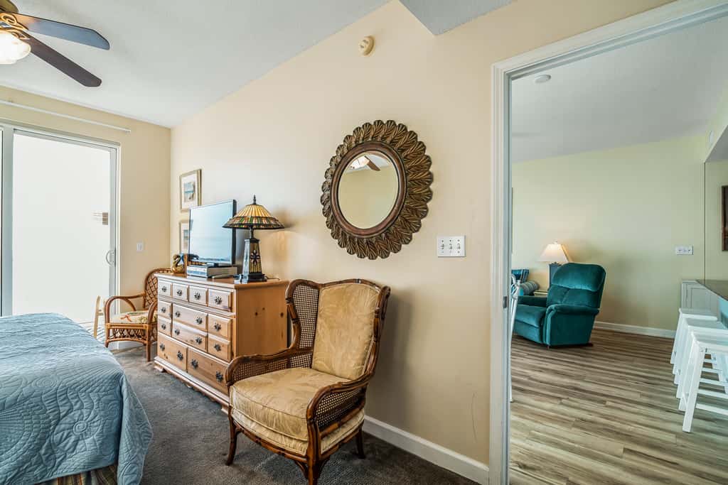 Snow-bird friendly condo with pool & fitness room - walk right out to the sand