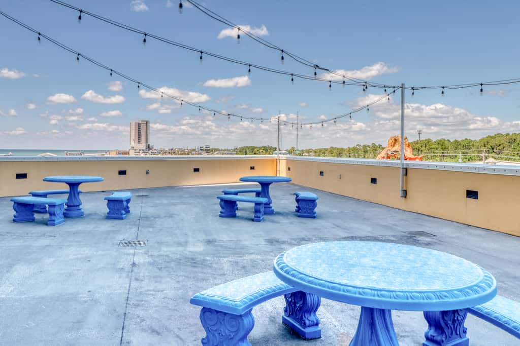 Snow-bird friendly condo with pool & fitness room - walk right out to the sand