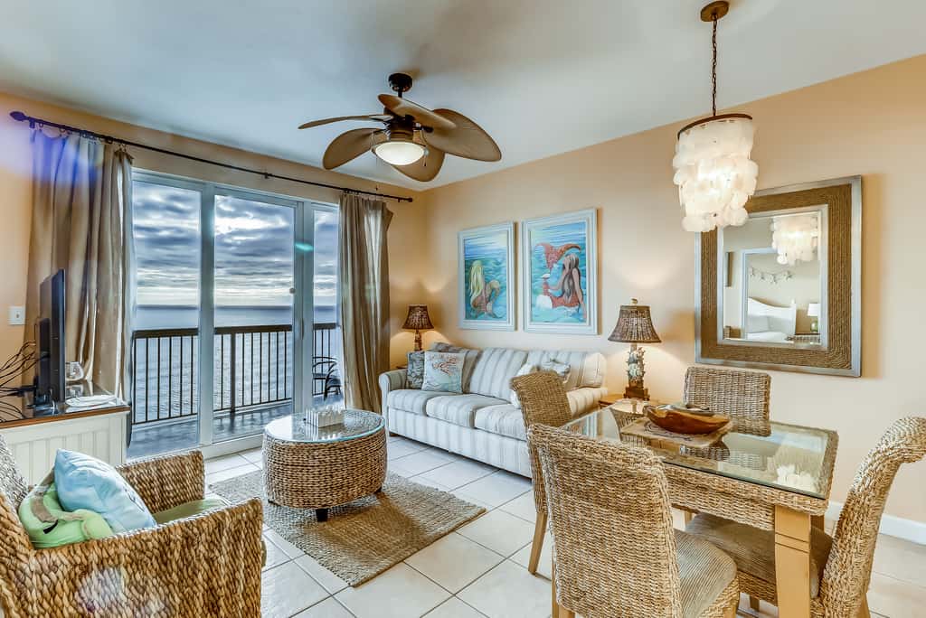Serene & upscale beachfront condo with furnished balcony, view, & pools