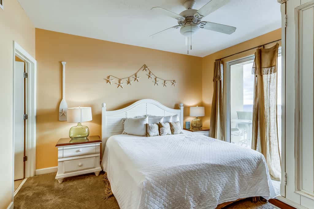 Serene & upscale beachfront condo with furnished balcony, view, & pools