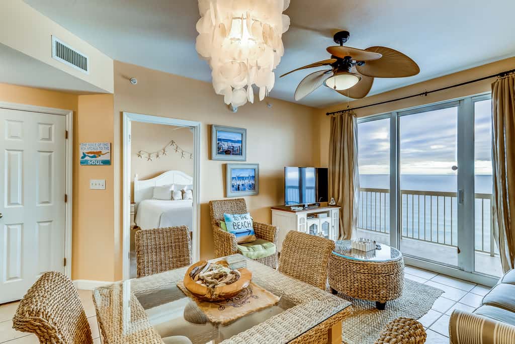 Serene & upscale beachfront condo with furnished balcony, view, & pools