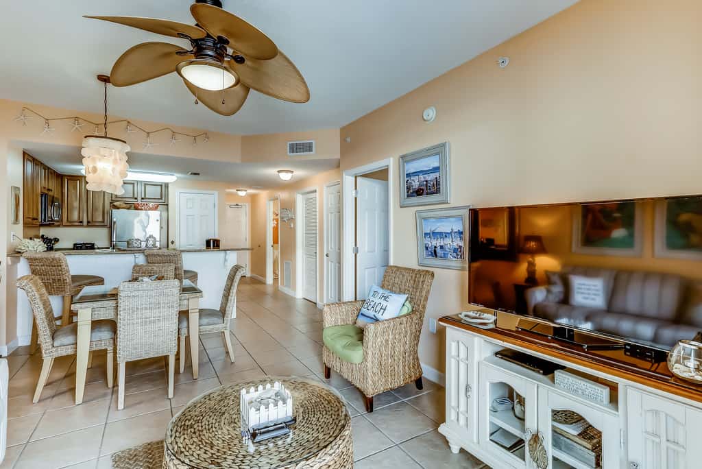 Serene & upscale beachfront condo with furnished balcony, view, & pools