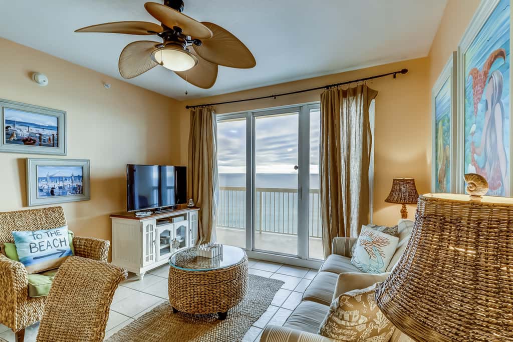 Serene & upscale beachfront condo with furnished balcony, view, & pools