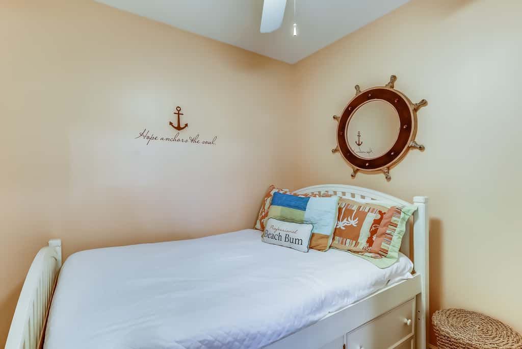 Serene & upscale beachfront condo with furnished balcony, view, & pools
