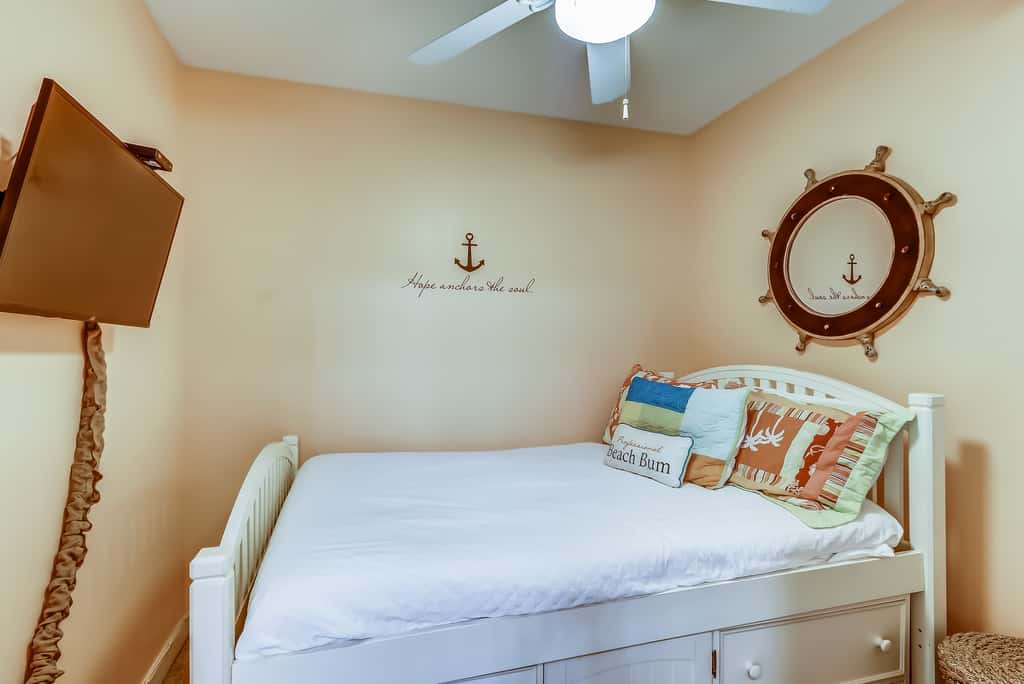 Serene & upscale beachfront condo with furnished balcony, view, & pools