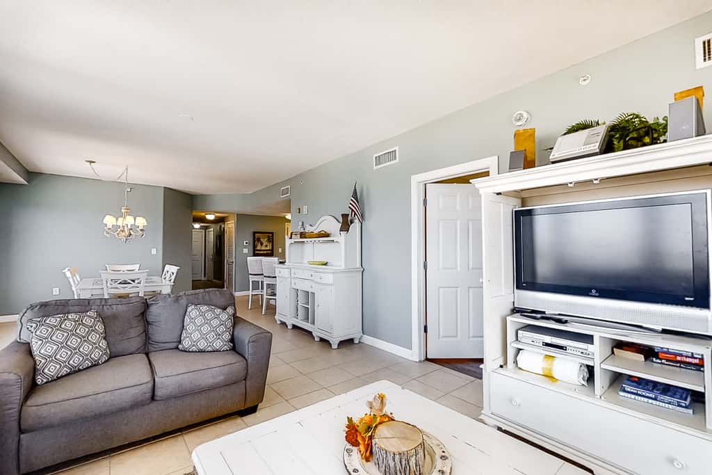Cool & contemporary beachfront getaway with large balcony, pools, & gym