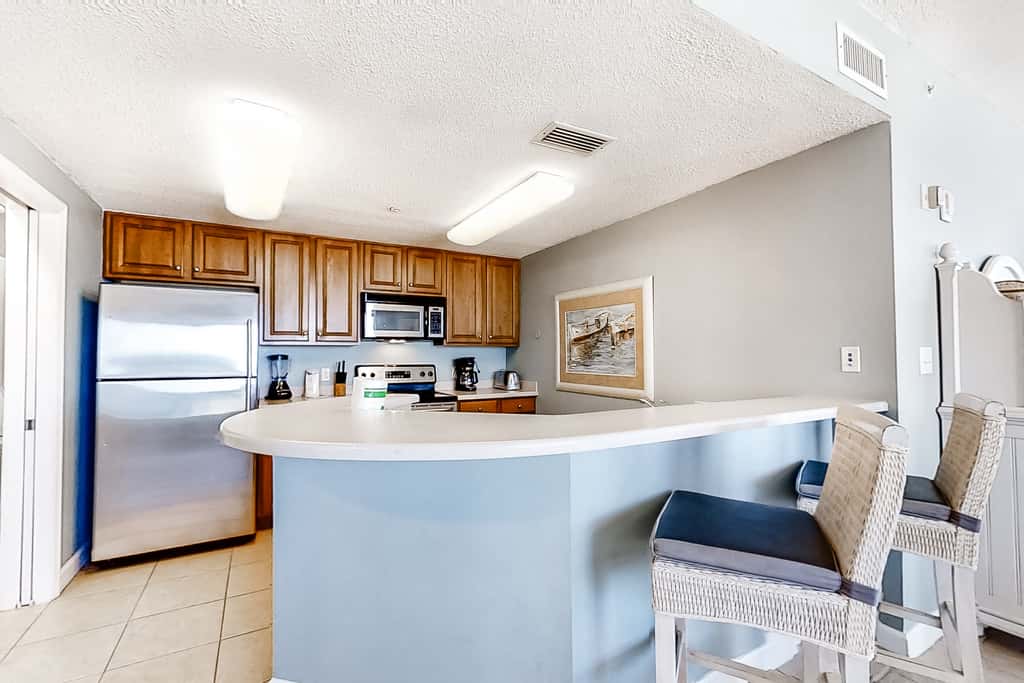 Cool & contemporary beachfront getaway with large balcony, pools, & gym