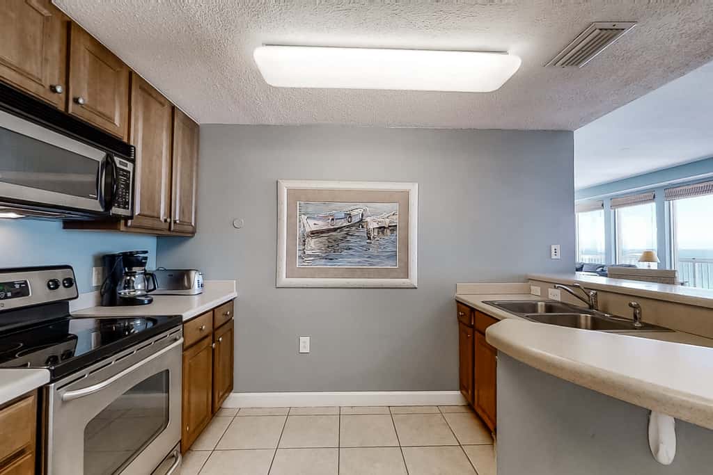 Cool & contemporary beachfront getaway with large balcony, pools, & gym