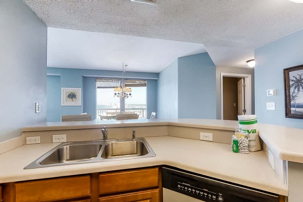 Cool & contemporary beachfront getaway with large balcony, pools, & gym