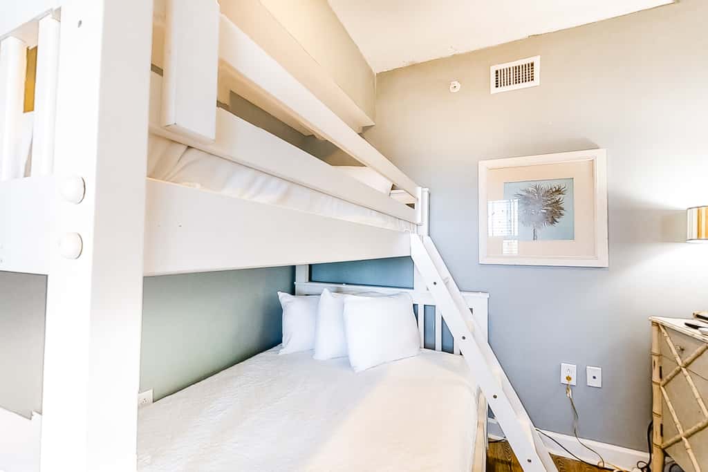 Cool & contemporary beachfront getaway with large balcony, pools, & gym
