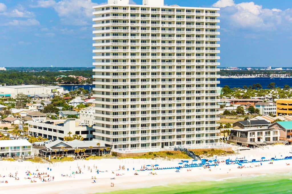 Cool & contemporary beachfront getaway with large balcony, pools, & gym