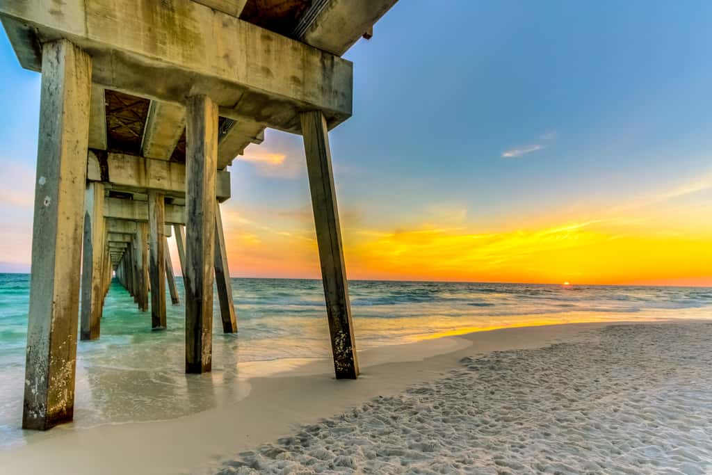 Cool & contemporary beachfront getaway with large balcony, pools, & gym