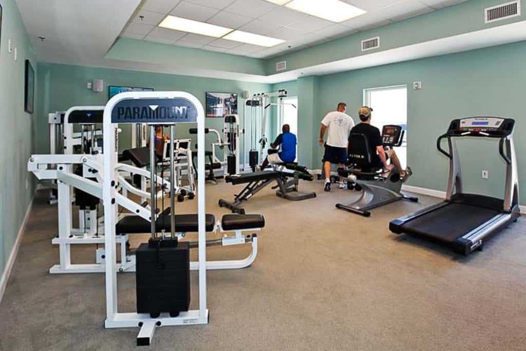 Cool & contemporary beachfront getaway with large balcony, pools, & gym