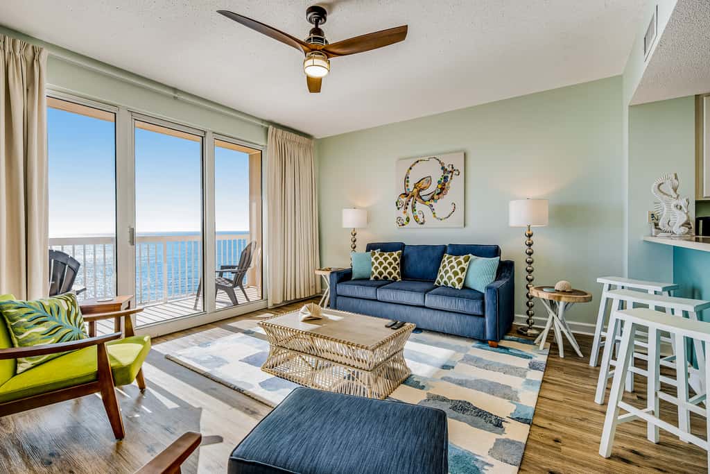 Tropical, waterfront oasis with furnished balcony, pools, & beach access