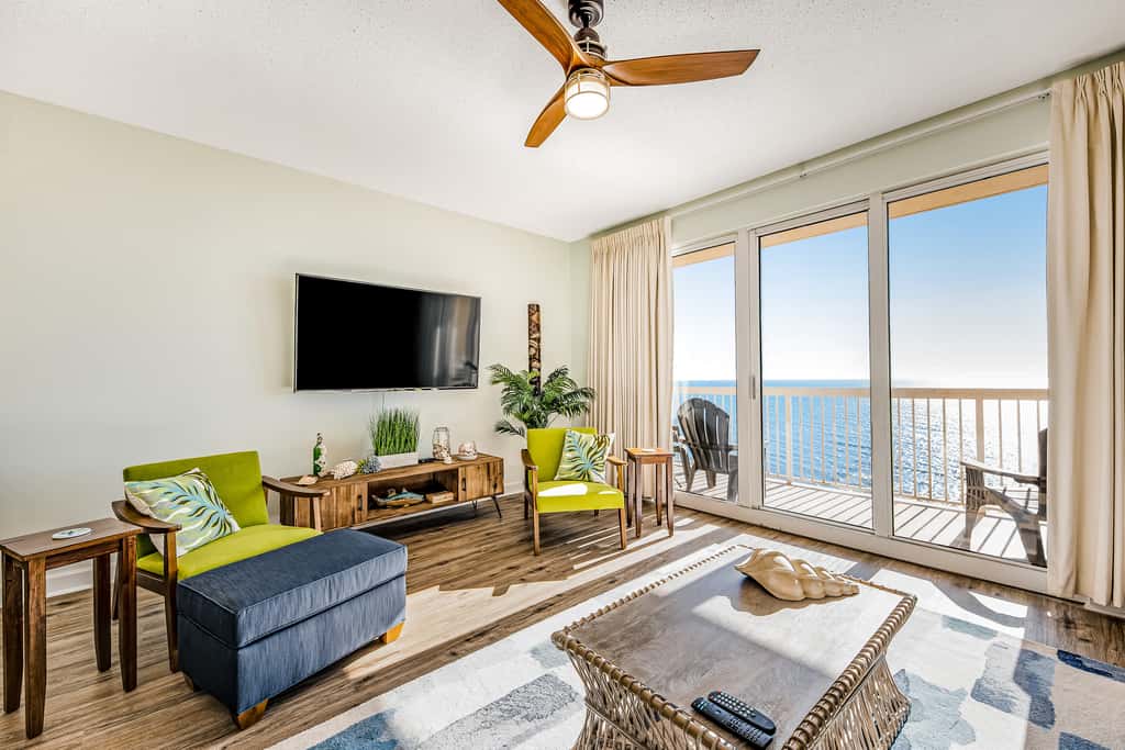Tropical, waterfront oasis with furnished balcony, pools, & beach access