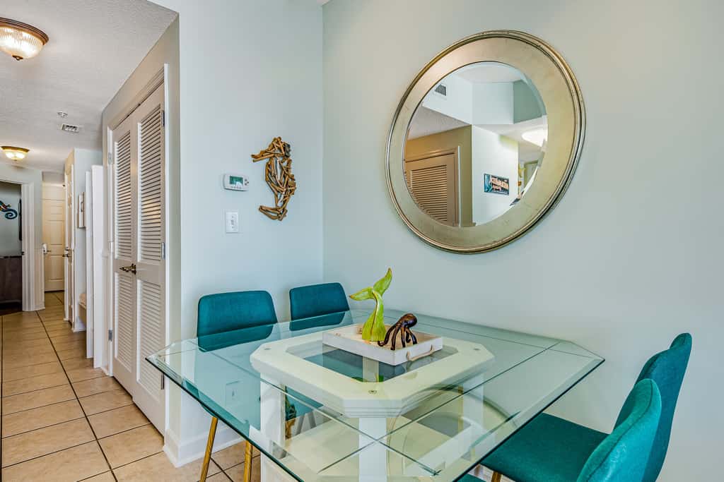 Tropical, waterfront oasis with furnished balcony, pools, & beach access