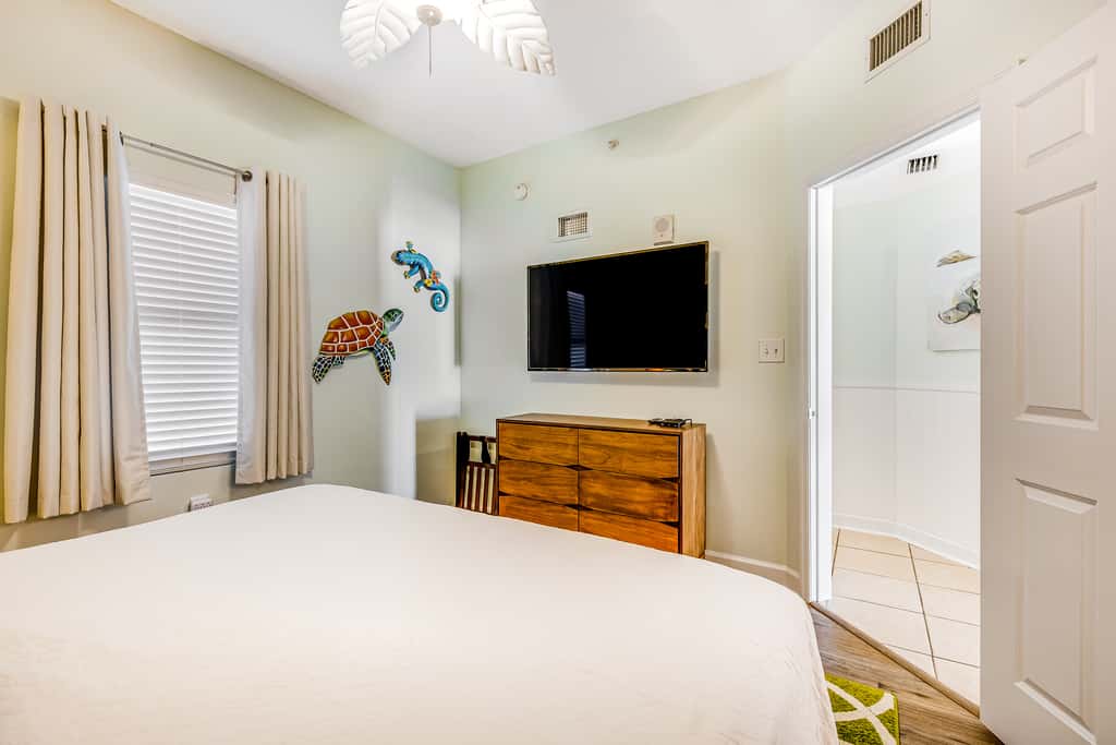 Tropical, waterfront oasis with furnished balcony, pools, & beach access