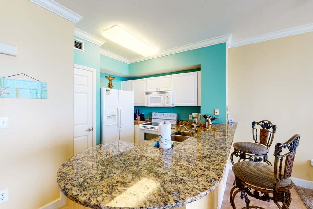 Gulf-front condo with 2 lagoon pools, hot tubs & beach service - near Pier Park