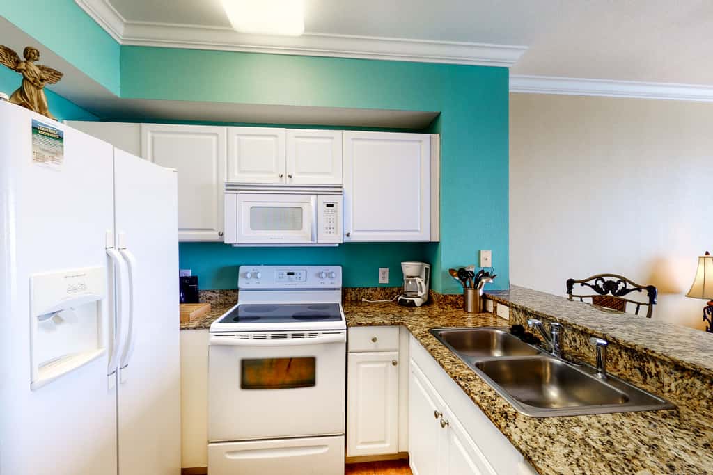 Gulf-front condo with 2 lagoon pools, hot tubs & beach service - near Pier Park