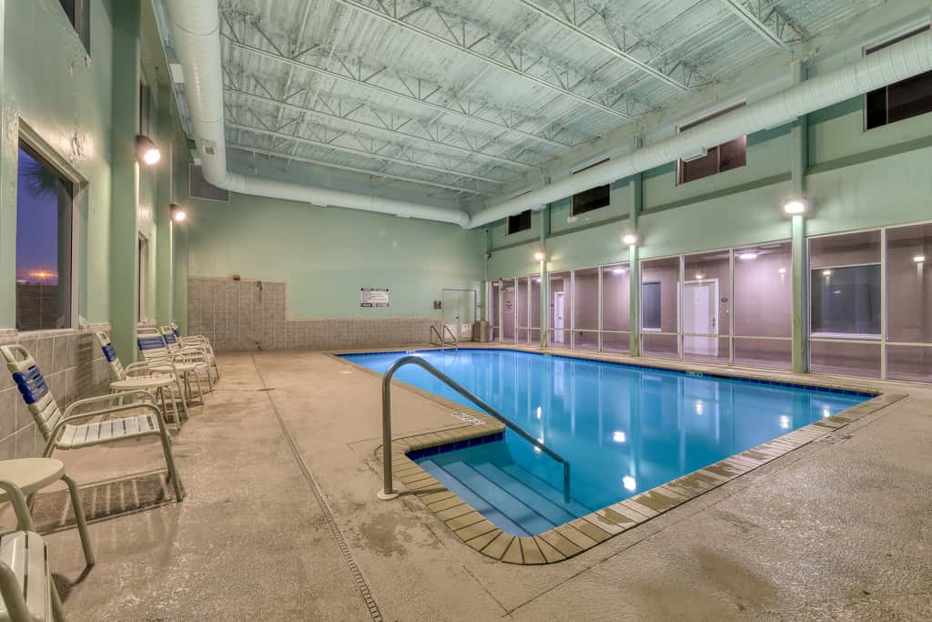 Gulf-front condo with 2 lagoon pools, hot tubs & beach service - near Pier Park