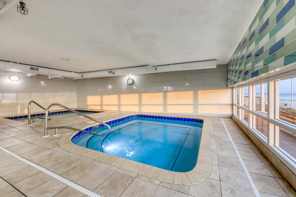 Gulf-front condo with 2 lagoon pools, hot tubs & beach service - near Pier Park