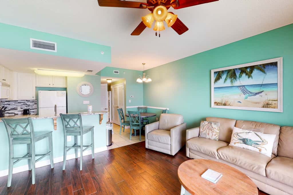 Beachfront, seafoam sanctuary with furnished balcony, pools, & gym