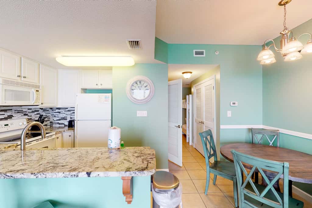 Beachfront, seafoam sanctuary with furnished balcony, pools, & gym