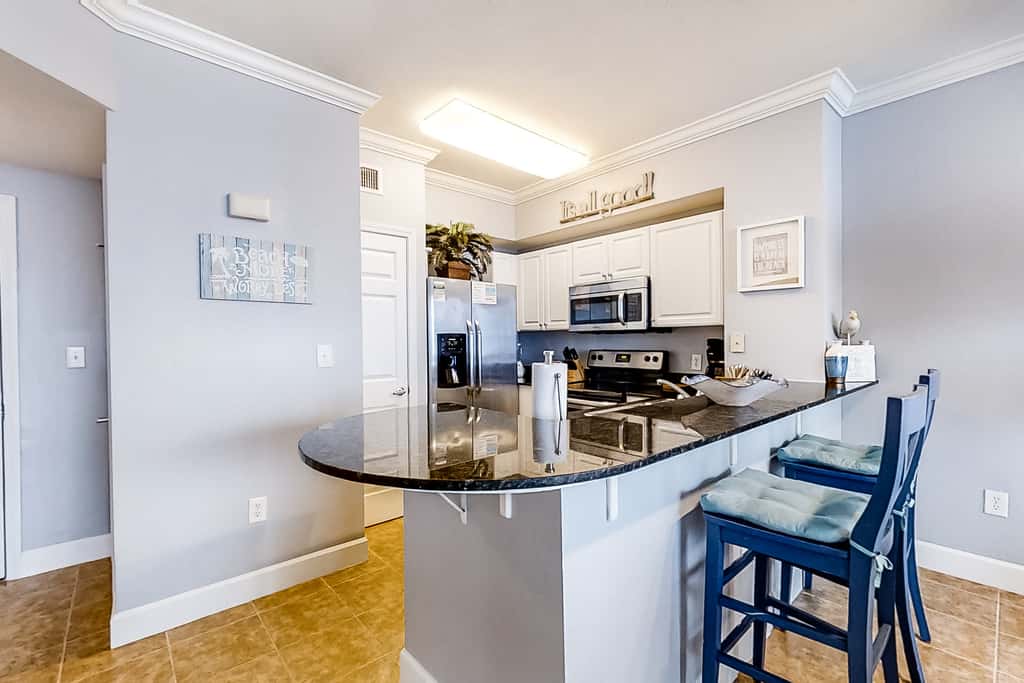Serene beachfront condo with gulf views & resort pools, hot tubs, beach service