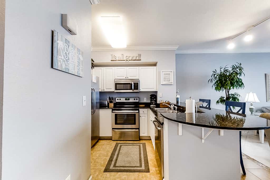 Serene beachfront condo with gulf views & resort pools, hot tubs, beach service