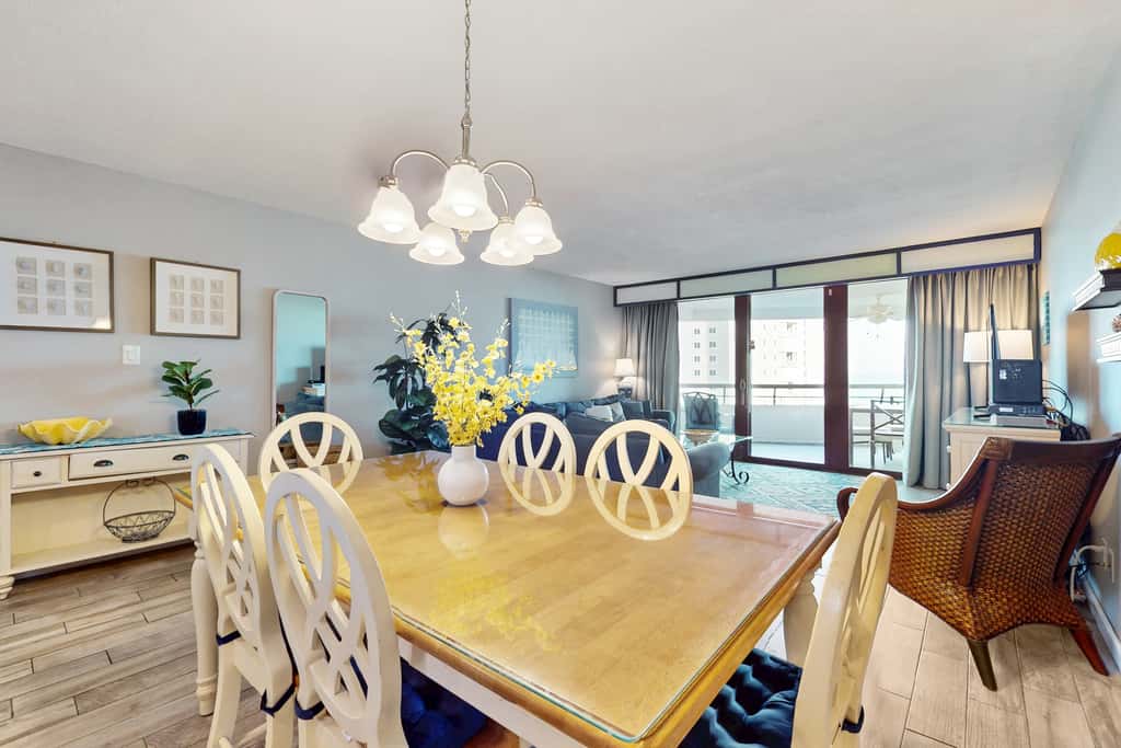 8th floor condo with Gulf views, balcony, pools, hot tubs, central AC, and WiFi
