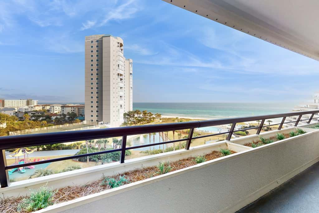 8th floor condo with Gulf views, balcony, pools, hot tubs, central AC, and WiFi