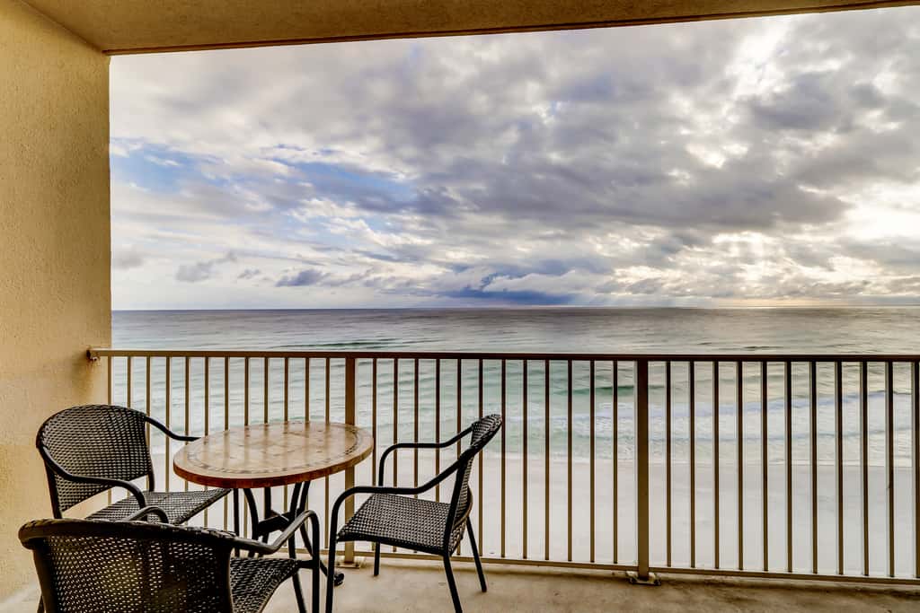 Inviting waterfront condo with shared pools, a hot tub, gym, & beach access