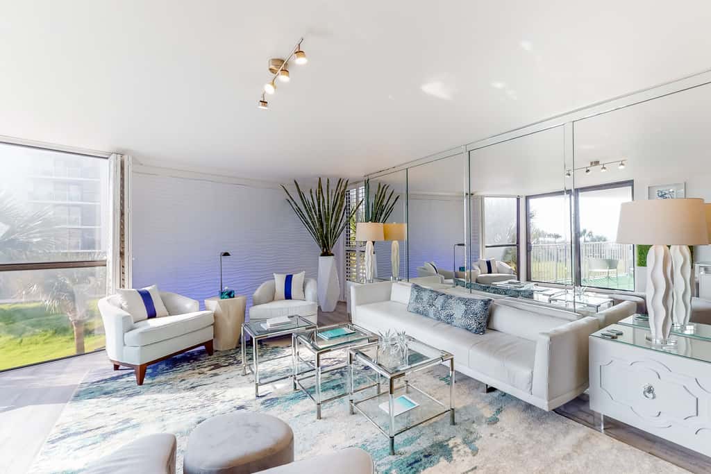 Ocean-view condo with pools & hot tub, balcony, central AC, W&D
