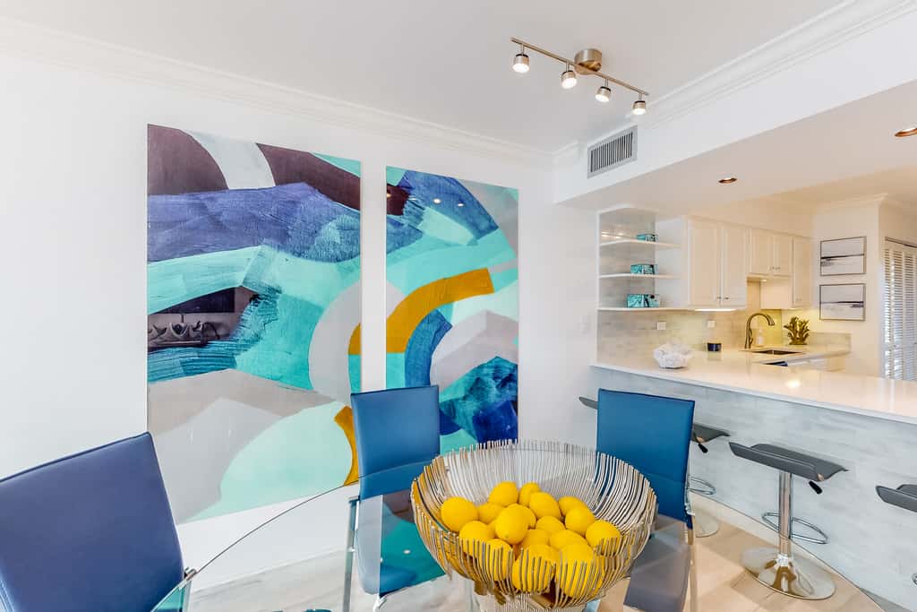 Ocean-view condo with pools & hot tub, balcony, central AC, W&D