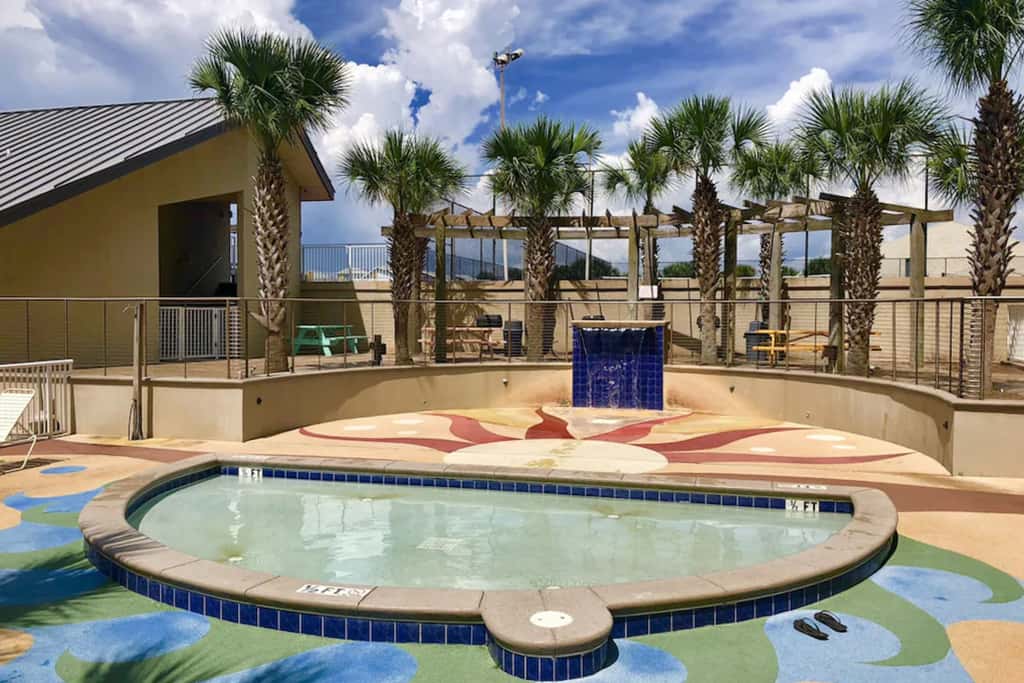 Ocean-view condo with pools & hot tub, balcony, central AC, W&D