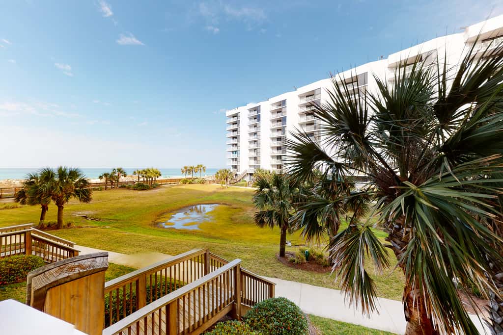 Ocean-view condo with pools & hot tub, balcony, central AC, W&D