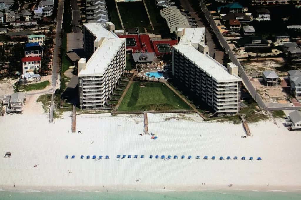 Ocean-view condo with pools & hot tub, balcony, central AC, W&D