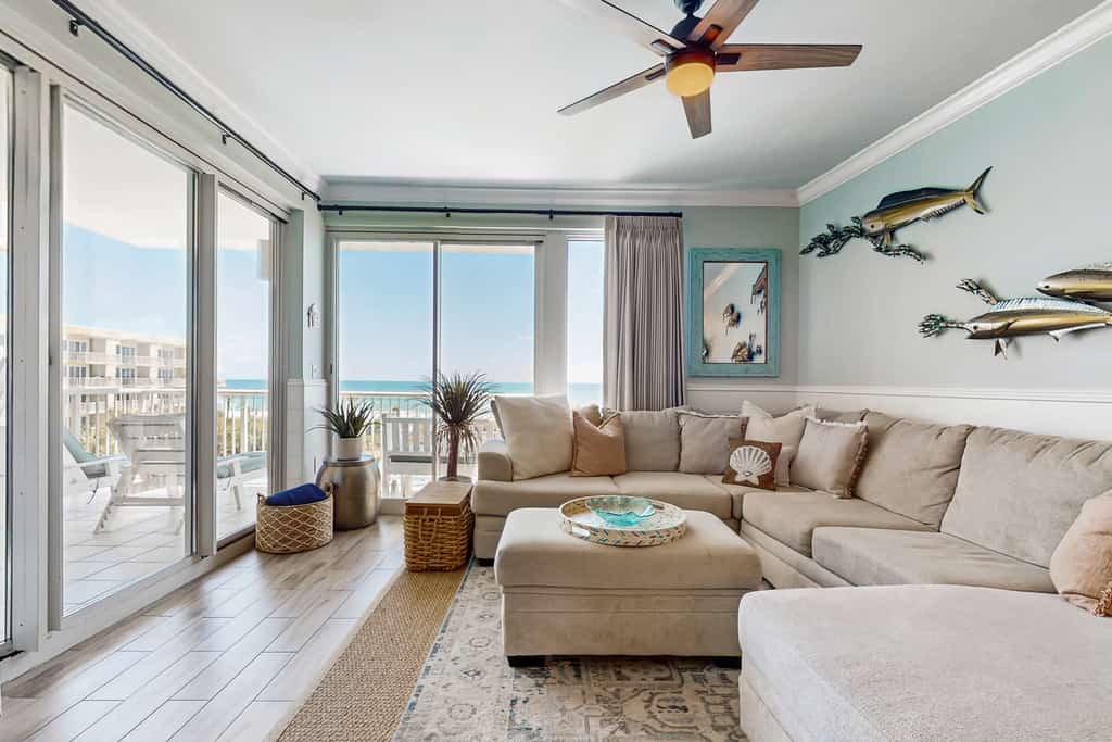 Gulf-front condo with balcony and access to pools, hot tub, gym