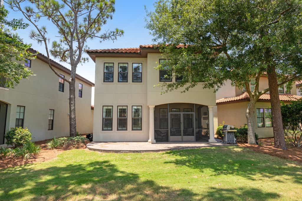 Sunny getaway with 2 golf carts, patio, grill, pool,  & tennis