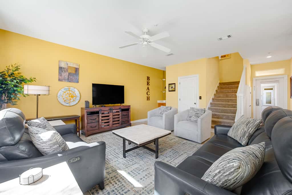 Dog-friendly townhome with golf cart, close to shops, restaurants, pools, & beach