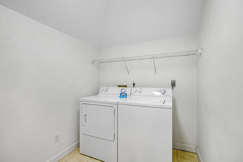 Dog-friendly townhome with golf cart, close to shops, restaurants, pools, & beach