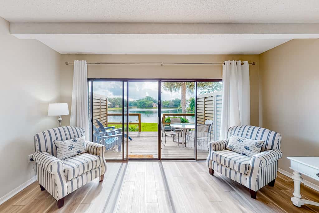 Lakefront resort condo with lake views, hot tub, pool, tennis, golf, deck, W&D