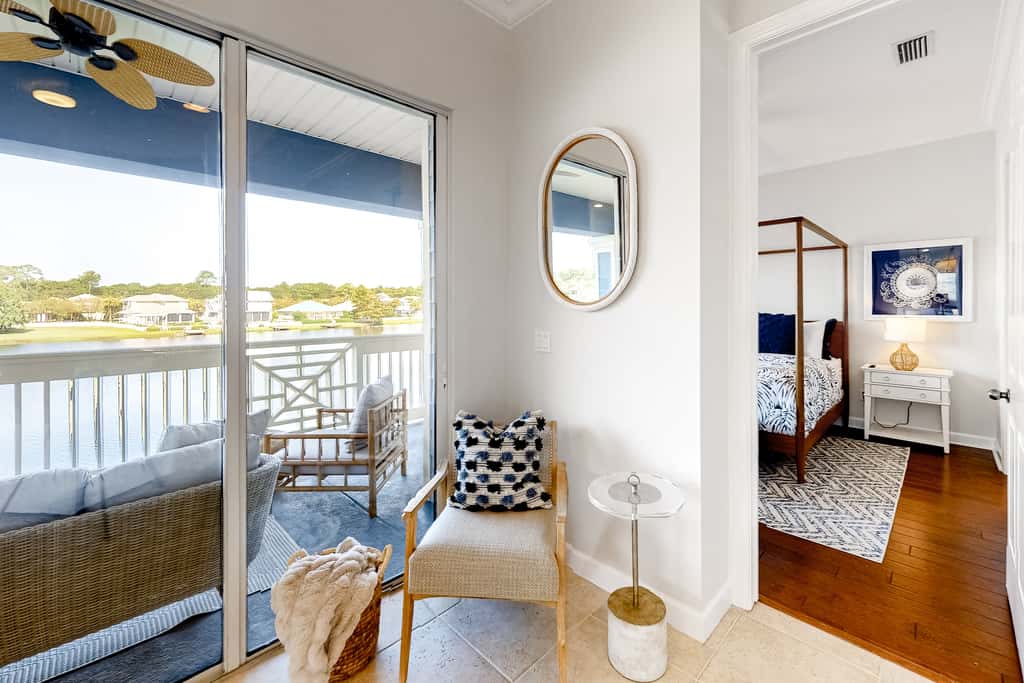 Lakefront condo with water-view balcony, private golf cart, resort pool & amenities
