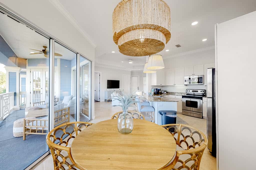 Lakefront condo with water-view balcony, private golf cart, resort pool & amenities