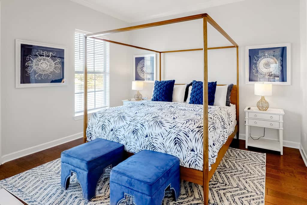 Lakefront condo with water-view balcony, private golf cart, resort pool & amenities