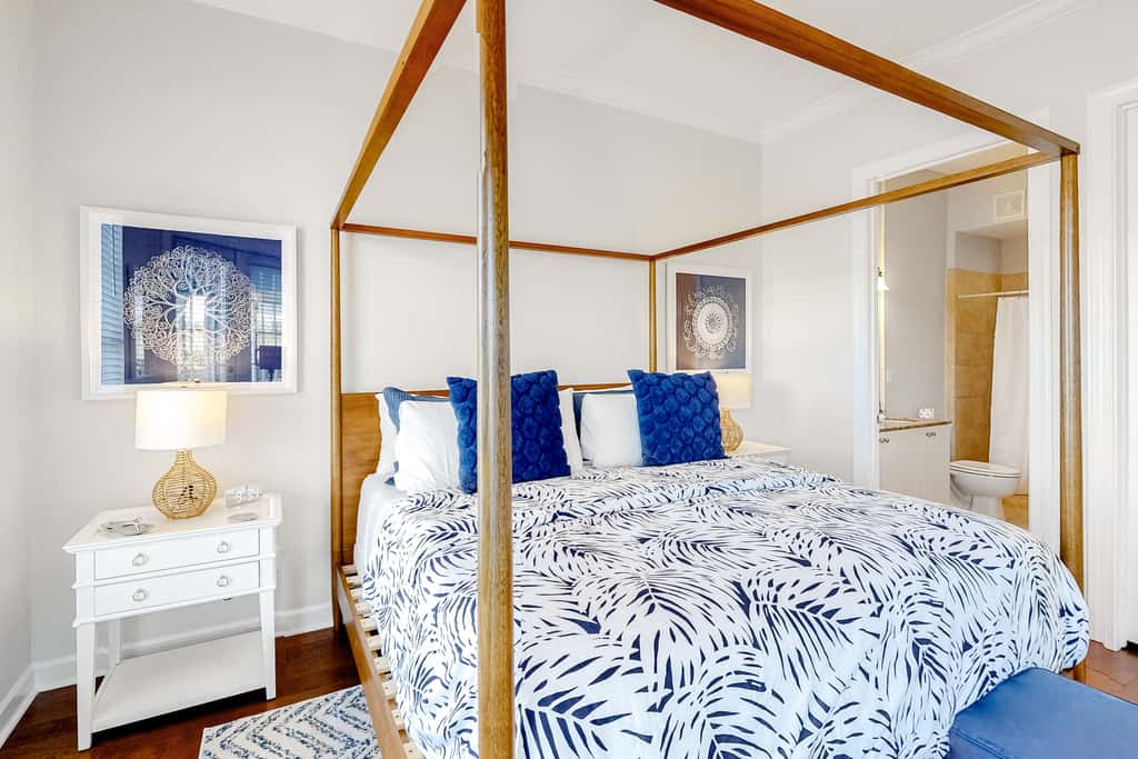 Lakefront condo with water-view balcony, private golf cart, resort pool & amenities
